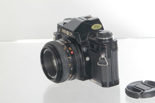 Minolta 300 con 1 - x, 1,7
