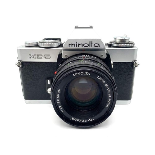 Minolta md - +,