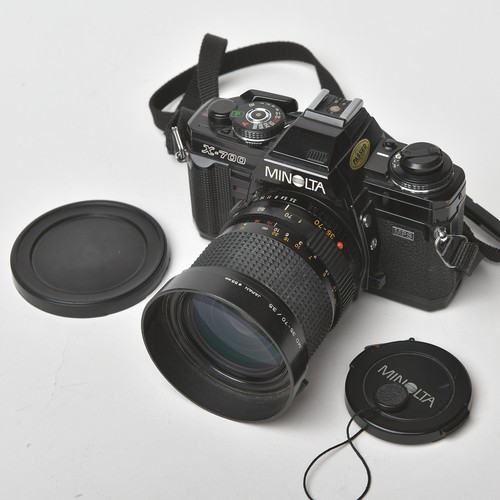 Minolta 700 md - +,